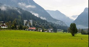 Time lapse of mountain village in Austria in the summer time. Valley view in 4k.