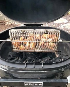 2.2K views · 44 reactions | Spinning some chicken wings in the new Primo Ceramic Grills rotisserie basket. This basket is just one of many accessories we have line up for our rotisserie. •  creds: @empiregroupnick | Primo Ceramic Grills | Facebook