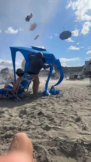 You can stand under my umbrella #tornado #yorkbeach #flyingumbrellas #fyp