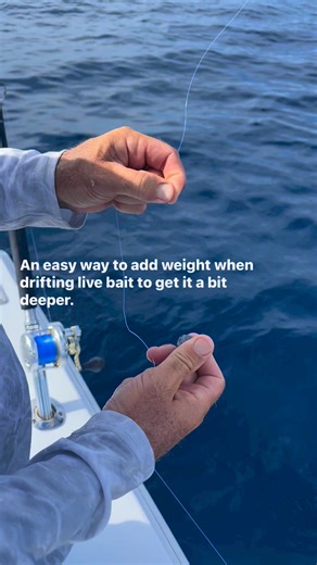 Capt. Joe Dobbins, co-captain with Capt. George LaBonte aboard their Minn Kota-sponsored 28 Whitewater, shows an easy way to add and remove weight when drifting a flat line for sailfish. | Salt Water Sportsman