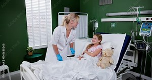 A Caring Nurse Attending to a Young Patient in a Hospital Room with Compassionate Support