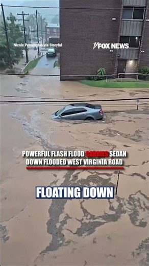 POWERFUL flash flood carries sedan down road #shorts #us #news #viral