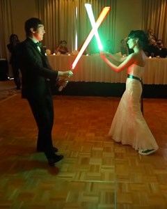 This Bride and Groom's First Dance Was a Lightsaber Battle — GeekTyrant