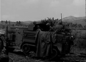 A USMC M3 using its 75mm gun in direct fire on Guam in 1944 | Task & Purpose