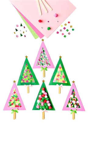 Vicki | kids art, crafts and activity ideas on Instagram: "Christmas craft - mixed media art 💚 Quick and simple to prep, the kids had brilliant fun making them! To make ours I pre cut our triangles, removing the middle so we could attach our sticky back paper (sellotape works perfectly for this too!) Next the girls had fun filling them in, creating lots of variations! ⭐️ We used tissue paper, pom-poms, buttons, sparkles, and festive-shapes! We finished them off with sticks! ✨ An easy technique 