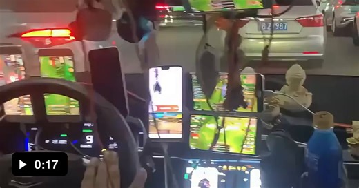 Modern Multitasking: Because Driving with Only One Screen is Just Too Boring - Video