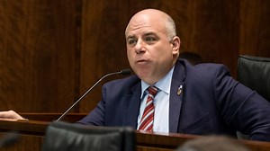 Ex-Illinois lawmaker abruptly pleads guilty to fraud and money laundering, halting federal trial