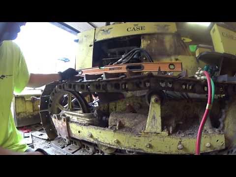 case dozer adjusting the track