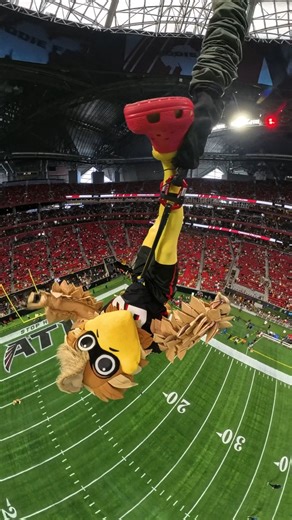 1.5M views · 7K reactions | Highest rope swing drop (indoors): 43.71 m (143 ft 5.25 in) by Atlanta Falcons Freddie Falcon. Good luck to the Atlanta Falcons who made Guinness World Records history and are now finalists in The Webby Awards Check out the link below to find out more and give them a vote! ️ | Guinness World Records | Facebook