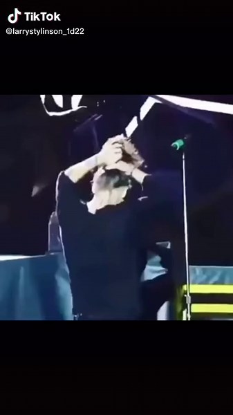 Get Harry Styles' Hair Bun Tutorial for a Stylish Look