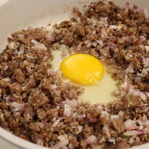 Ground Pork Giniling Sisig one of the Easiest way in making Pork Sisig, Because you don't need to Grill or deep fry the Pork you just Saute and Its done. Pork Sisig is a famous Filipino dish usually made of Crispy Lechon Kawali or Grilled Pork toss with Onion, Spring Onions, Green Chilli, Eggs and Serve with Calamansi on the Side. Pork Giniling Sisig Ingredients: 500 grams Ground Pork 2 Pieces Onion 1/2 Tablespoon Butter 2-3 Pieces Calamansi 1 Piece Green Chili 2 Pieces Egg Liquid Seasoning Blac
