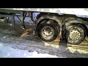 Snow Plow Rescues Lorry Stuck in the Snow.