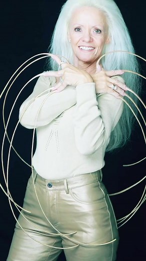 Guinness World Records is saddened to announce the passing of legendary record holder Lee Redmond (USA), who for many years held the record for longest fingernails ever. Lee's magnificent nails measured a total length of 7 m 51.3 cm (24 ft 7.8 in). One thing Lee used her Guinness World Records title holder status for was to give motivational speeches: