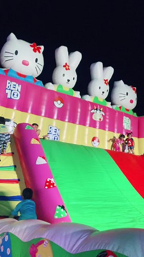 Children's Nighttime Fun on Inflatable Slide