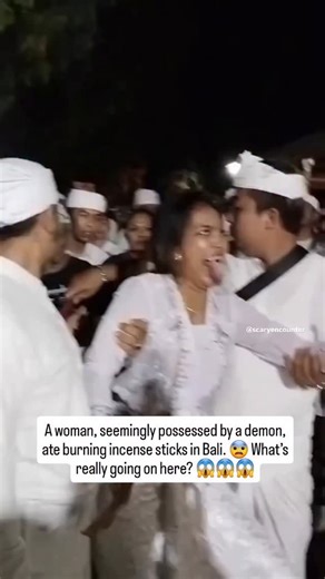Scary_Encounter5 on Instagram: "In Bali, a woman was seen acting strange — like she was possessed by a demon or spirit. Two men were holding her down as she was growling and trying to get away. Then, something terrifying happened… she ate a burning incense stick. What do you think is going on here? 🤔 Could it be a ghost, a jinn, or a demonic possession or some kind of ritual ?.. Follow 👉 @scaryencounter 👈 for more mysterious unsettling videos on IG No copyright infringement intended. DM and I