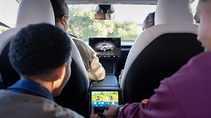 Tesla cars will soon let you play games while they drive themselves says Elon Musk