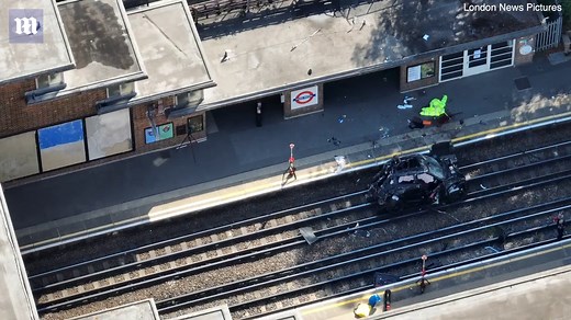 Range Rover ends up on tube track after crashing into parked Tesla