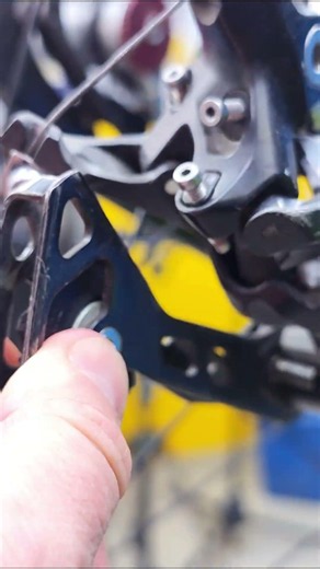 Removing a bicycle wheel with an unusual axle inside the hub axle