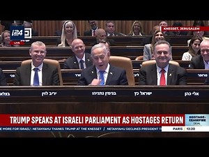 Hadash party leader Ayman Odeh and party member Ofer Cassif interrupt President Trump's speech