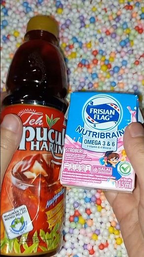 found Frisian Flag strawberry milk and Pucuk Harum tea in the box #snacks #huntingjajan #jajan