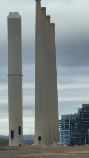 Industrial Smokestacks Emit Large Plumes of Smoke