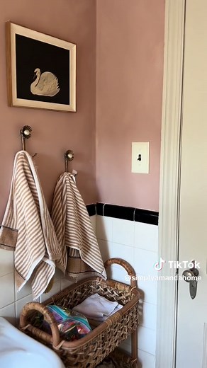 ZERO-RENO bathroom refresh using the original 1940s tiles, here it is! If you missed it, I first did a faux diy limewash paint on the walls, re-used shelves and the mirror I already had, added: a picture, new shower curtain & mat, new rattan storage unit and towel hooks— this reno was complete for under $300 but the space feels totally new! I used to dislike these tiles and now I feel like they work great The thing is, not everyone has 20k set aside for a new bathroom, but there is alwaysss some