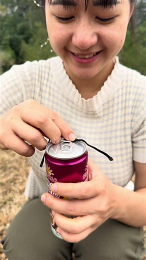 Using a string to open a soda can is very simple #bushcraft #shorts #survival #camping