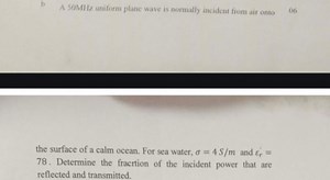 b A 50 MHz uniform plane wave is normally incident from air ont... | Filo