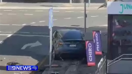 A nasty crash has brought a Bankstown street to a standstill, after a Tesla driver slammed into a power pole, bringing down live wires onto another car. #9News | 9 News Sydney