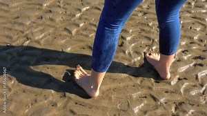 Girl Walking on the Beach, Wet Pants