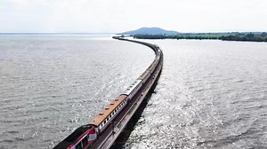 13K views · 142 reactions | Thailand’s unique “floating train” service launched its inaugural run in the first week of the year, attracting many tourists who were thrilled by the full-water scenery at Pasak Jolasid Dam in Lopburi Province. Read more: https://www.khaosodenglish.com/tourism/2024/11/03/thai-floating-train-launches-weekend-service-to-scenic-reservoir-route/ | Khaosod English | Facebook