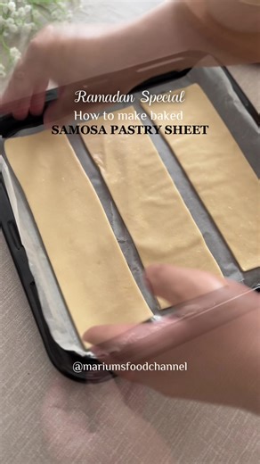 How to make homemade Samosa Pastry Sheets! (Samosa patti ) 🌟Ingredients •2cups All-purpose flour •1tsp Salt •100-150ml Cold Water (use as required) •1tbsp Canola Oil or Ghee •Oil (as required) for samosa sheets Method Combine all the ingredients in a bowl mix together until turns into a firm dough (use water as needed) Rest for 35-40 minutes . Divide the dough into 10 equal portions (55g) then use butter and spread over each portion until finished . Roll it into a large circle Cut the edges ,fo