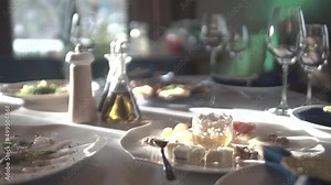 table set for the holiday. birthday. Close-up of wine glasses on a table. served table before the holiday. snacks prepared for food. waiting for guests. buffet reception. sandwiches and brusettes