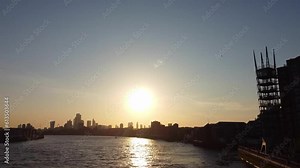 High Angle Footage of Central London Buildings and River Thames at Canary Wharf Central London. The Footage Was Captured During Sunset over London City of England UK on June 08, 2023 with a Drone