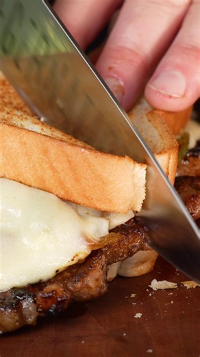 Now this is what you call a sandwich! Ribeye steak seasoned with our Beef Rub, Texas toast, peppers, onions, and plenty of melted cheese. The ultimate weekend sandwich! Full Recipe - https://ow.ly/YhfN50WJ5li #ribeye #steak #sandwich #recipes #grilling #cooking #heathrilesbbq #pitmasterheathriles #heathrilesbbqproducts | Heath Riles BBQ