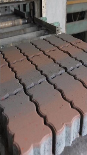 Process of mass producing interlocking blocks. A Japanese factory that makes unbreakable blocks.