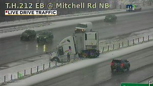 Jack-knifed semi! A big rig is caught up in the cable median barrier on Highway 212 near Mitchell Road in Eden Prairie. Roads are slick around the metro, adjust your speeds accordingly. | KSTP-TV