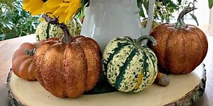 Add Some Sparkle to Your Halloween Decor With These DIY Glitter Pumpkins