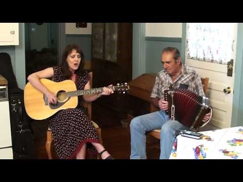 Lisa Trahan and her dad Harry perform the traditional Cajun tune Marais Buller