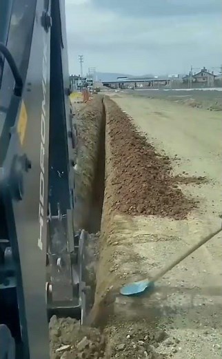 "Perfect Trench Teamwork: Excavator + Shovel = Precision"