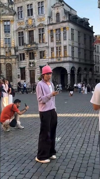 Jhope spotted casually walking and taking pictures on the streets of Brussels😍💜