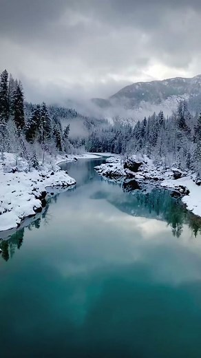 Glacier National Park in the winter. Shot from the historic Belton Bridge, built in 1920 over the Middle Fork of the Flathead River. For decades, it was the primary entrance into Glacier National Park. These days, the bridge is closed to vehicles, and people like to jump off it in the summer. #glaciernationalpark