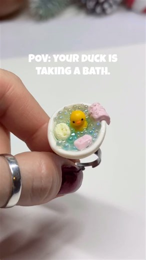 Ruby creations on Instagram: "Duck in a bathtub ring - handmade polymer clay ring. Ring #3 from this batch. First there was a frog in a bathtub, then a duck in a frozen lake… and now this duck saw the frog bathing and decided she’s next. Would you wear it? #polymerclay #polymerclayart #duck #miniatures"