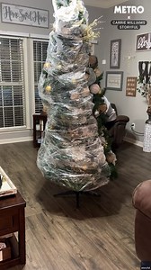 Christmas hack as woman unwraps fully decorated tree from last year