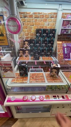 Exciting Claw Machine Adventure with Boxed Figurines