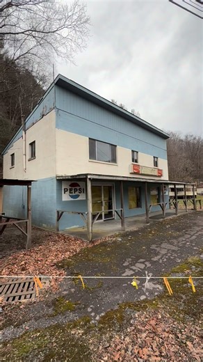 Dueling Coke and Pepsi signs at the old, now closed Hanging Rock Market in Russell County, Virginia, just a shade outside of St. Paul. | Real Appalachia