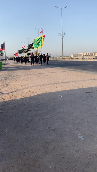 Middle Eastern Cultural Procession with Flags Display