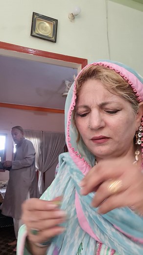 Traditional South Asian Sewing Techniques in Blue Attire
