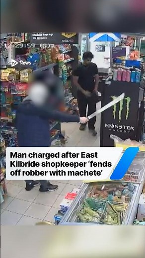 Man charged after shopkeeper 'fends off robber armed with machete'