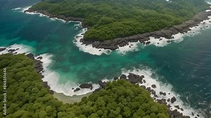 The awe-inspiring power of breaking waves is beautifully showcased in this mesmerizing aerial view of a stunning island reef being washed over by turquoise waters.